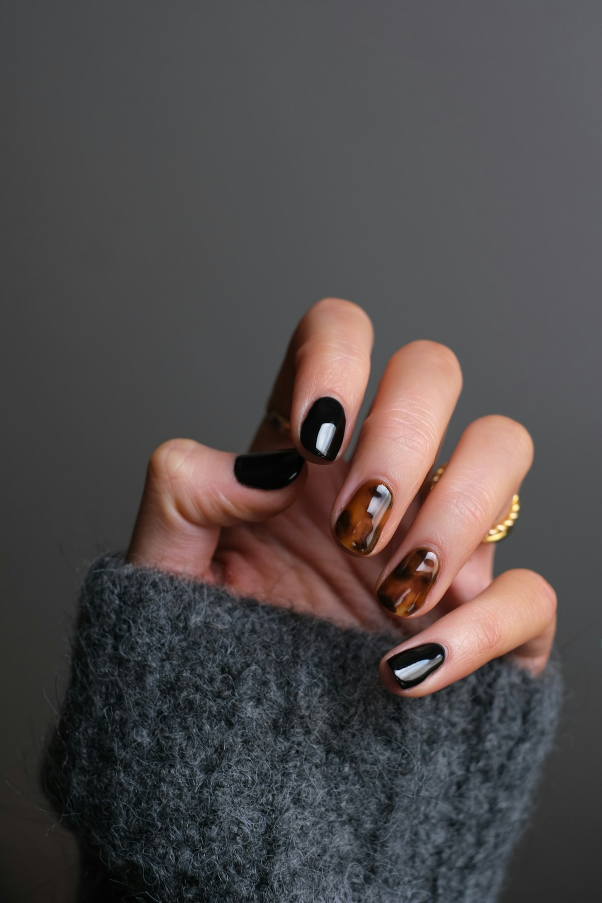 Colorful gel nail polish bottles and manicure supplies